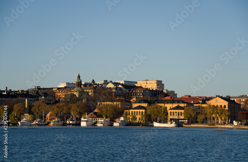 Houses, Pier and Boats on Kungsholmen island in Stockholm photo