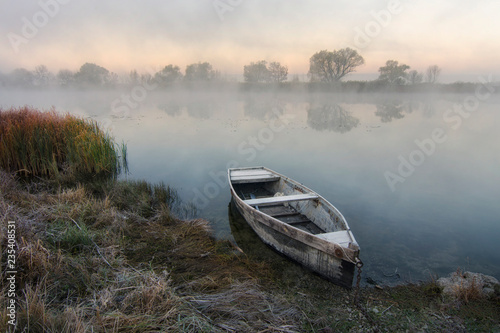 Lonely boat by the river
