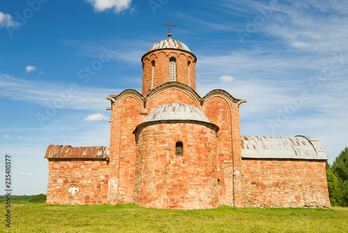 Old Church of the Transfiguration of Our Savior on Kovalyovo close-up on a sunny June day. Outskirts of Veliky Novgorod, Russia photo