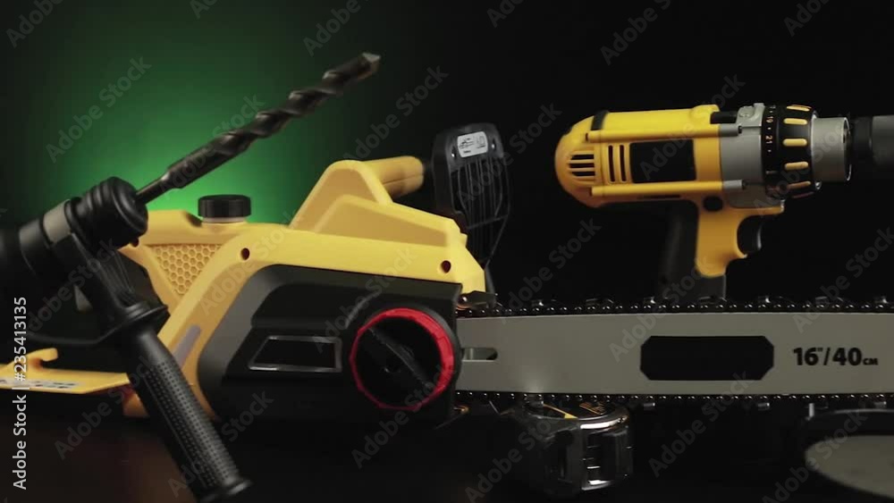 video posting tool on a black background, drill, hammer, saw