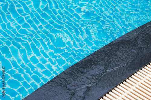 Pool edge With drainage grill.