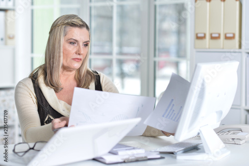 Portrait of two excited mature women working Free Download Portrait of two excited mature women working - GFXLoad