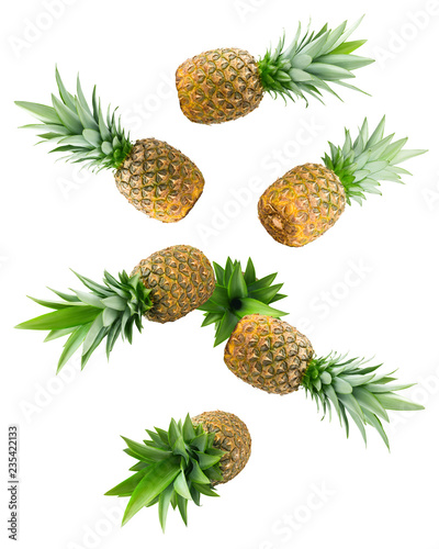 Falling pineapple isolated on white background, clipping path, full depth of field