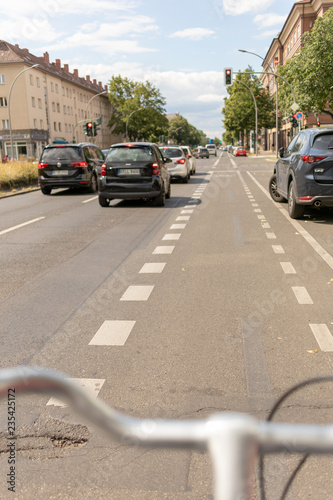 cars on road on a bike