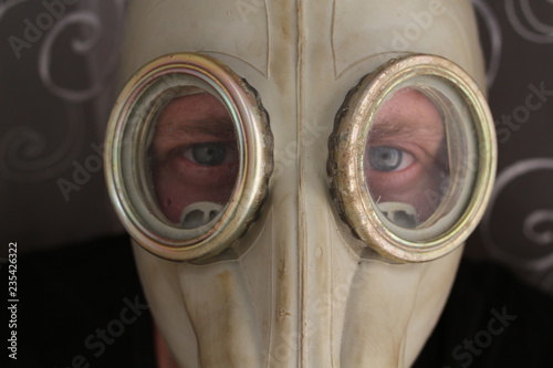 Gas mask on the man's face