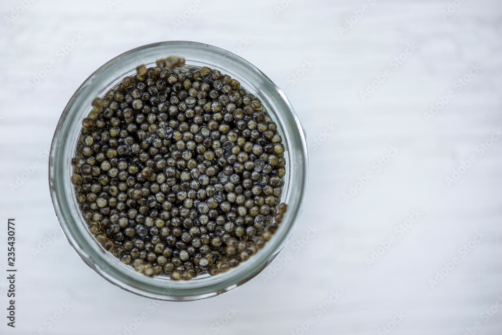 Top view of black beluga russian caviar, macro shot Top view of black beluga russian caviar, macro shot