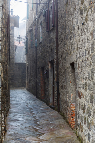 Dark mysterious narrow alley