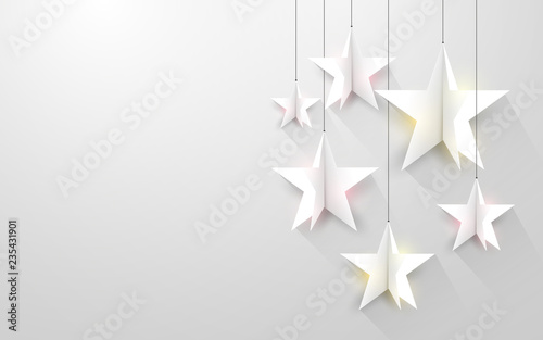 Paper art. White stars hanging on strings