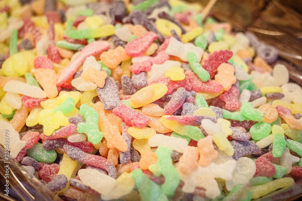 Candied gummy marmalade in the form of animals tomorrow green red tones. Candied gummy marmalade in the form of animals tomorrow green red tones.