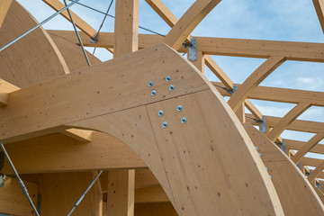 Detail of a modern wooden architecture in glued laminated timber