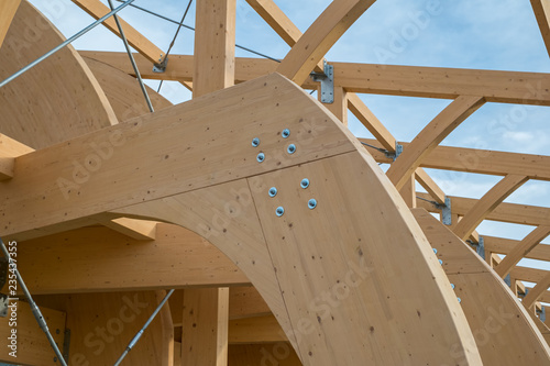 Detail of a modern wooden architecture in glued laminated timber