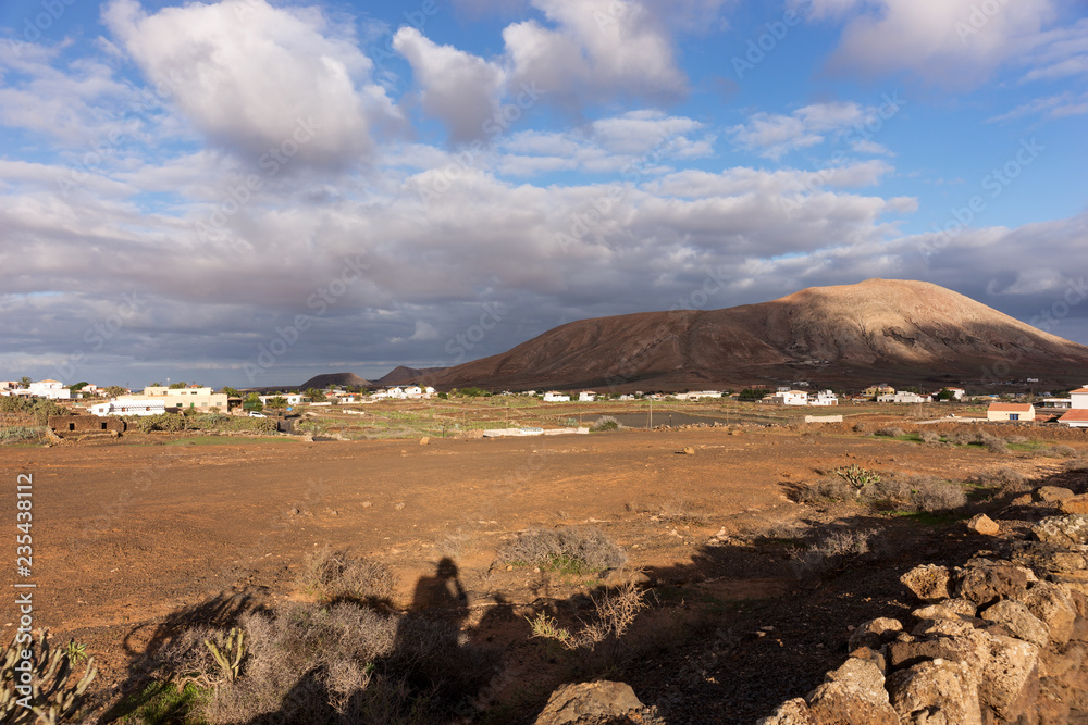 Landscape with cloudy sky in the region of La Oliva. Fuerteventura, Canary Islands, Spain Landscape with cloudy sky in the region of La Oliva. Fuerteventura, Canary Islands, Spain