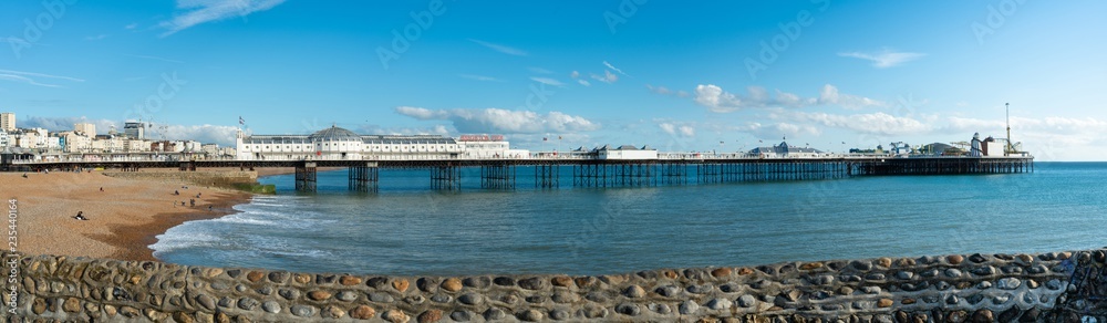 Beautiful panorama beach view of Brighton Pier and Brighton Beach the popular place for entertainment and fun park in the central at Brighton and Hove, England.