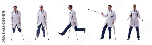 Young doctor physician standing walking isolated on white backgr © Elnur