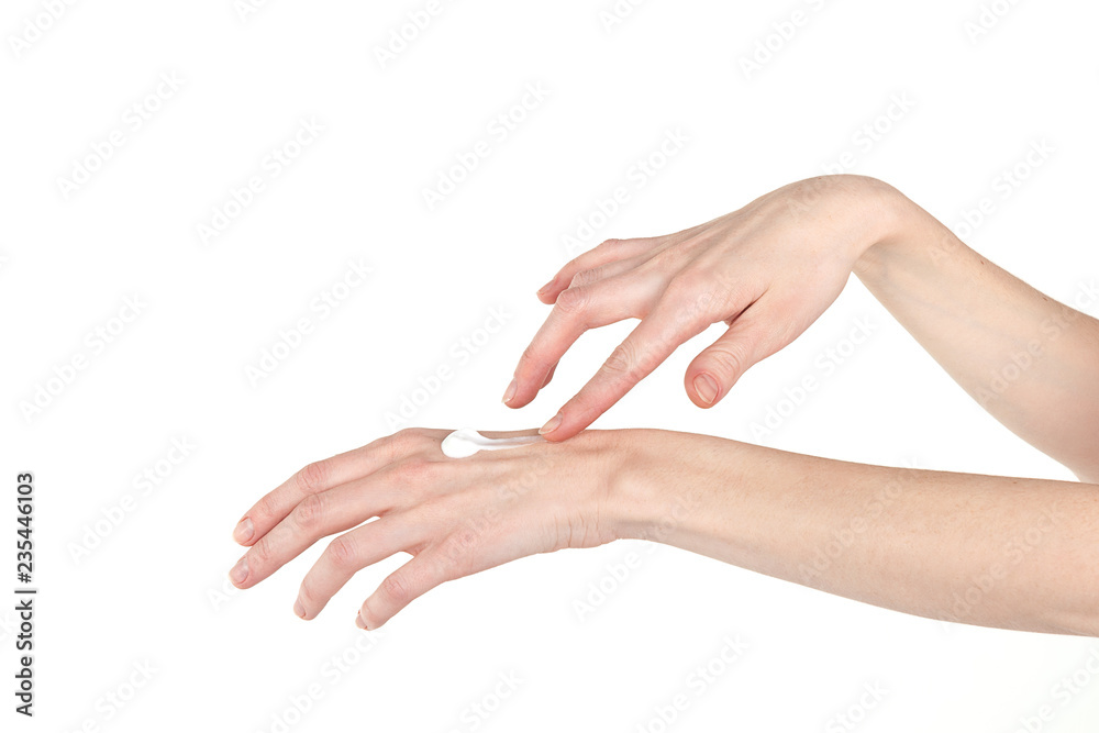 Elegant female hands smear hand cream. Skin care.
Elegant female hands smear hand cream. Skin care.