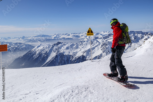 Snowboarder Les Grands Montets Ski Area in Argentiere near Chamonix with Canon 11mm - 22mm Wide Angle Lens