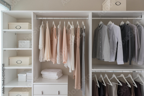 modern closet with clothes hanging © 290712