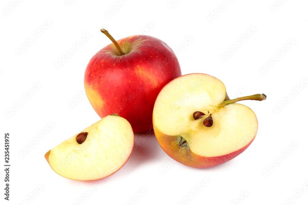 Red ripe apple with fresh sliced apple piece isolated on white Red ripe apple with fresh sliced apple piece isolated on white