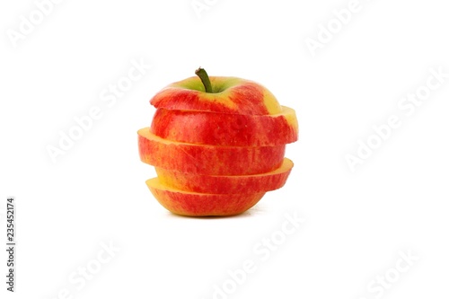 Sliced ripe apple over white background