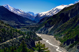 Himalayas mountain river valley with peaks in background