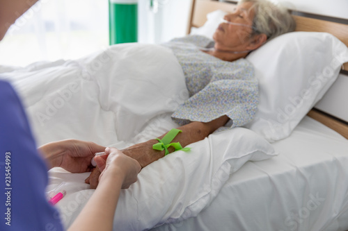 nurses check up on inpatient health elderly