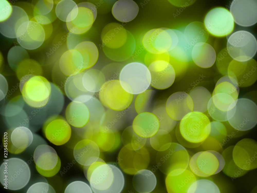 Fototapeta premium vibrant green glowing bright blurred lights abstract celebration background