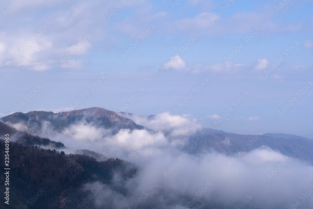 The overlooking from the top of the mountain / 山と雲と。山頂から眺めて。