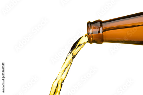 Bottle beer pouring isolated on white background with copy space object food and drink design