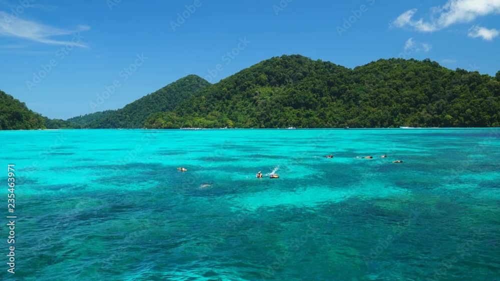 Phang Nga, Thailand - March 19, 2018 : Tourists are snorkeling at Surin Islands, The famous island for diving, snorkeling and relaxing of visitors at Phang Nga, Thailand Phang Nga, Thailand - March 19, 2018 : Tourists are snorkeling at Surin Islands, The famous island for diving, snorkeling and relaxing of visitors at Phang Nga, Thailand