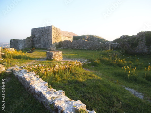 An old stone ruin with a fountain from the Rozafa Castle in Shkodra.  photo