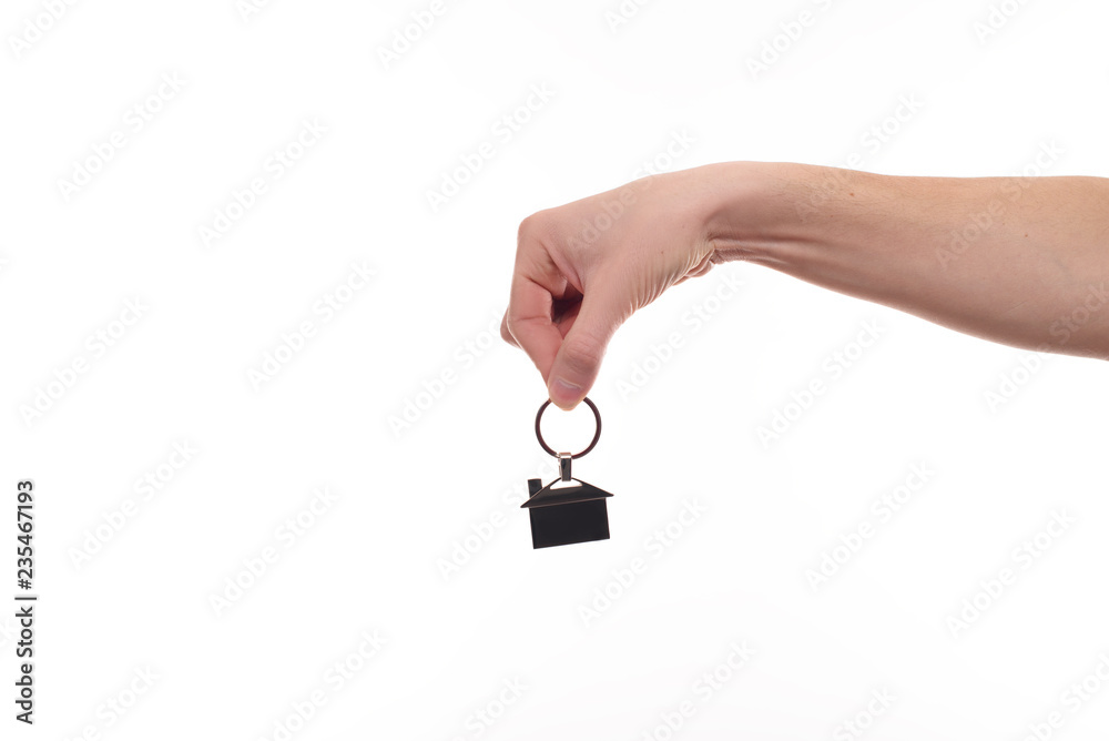Hand holding keys, isolated on white background Hand holding keys, isolated on white background