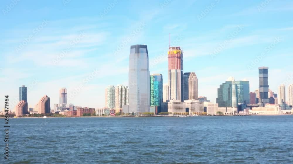 New York, Manhattan. Water front view of Manhattan from cruise boat at sunny autumn day. New York, Manhattan. Water front view of Manhattan from cruise boat at sunny autumn day.