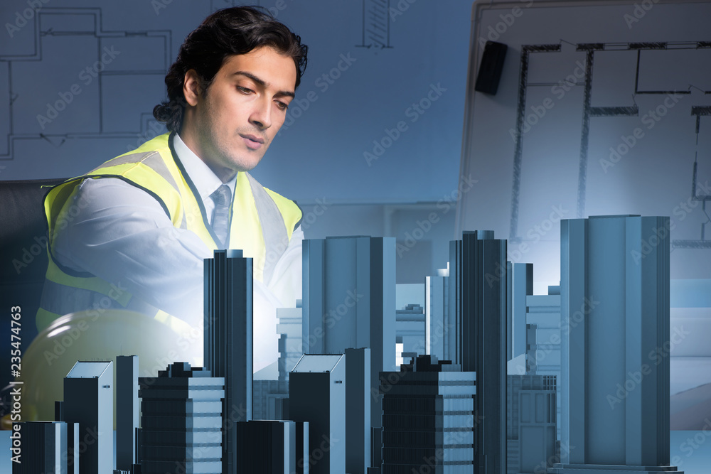 Fototapeta premium Futuristic architect doing urban planning