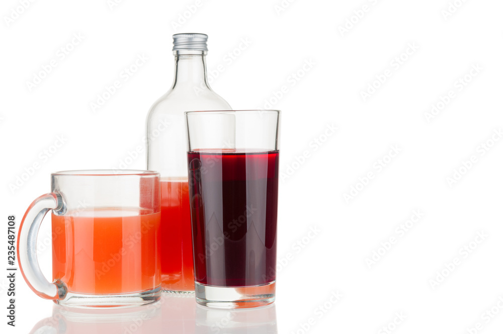 Bottle and glasses with fresh juice isolated on white background Bottle and glasses with fresh juice isolated on white background