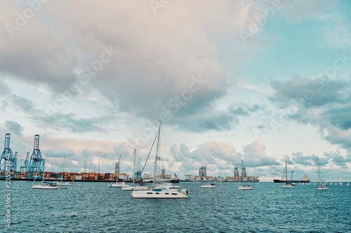 sailing boats are leaving the city marina for the atlantic crossing regatta race ARC 2018 on a sunny day