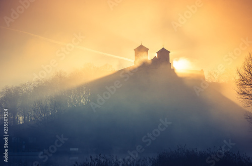 Krakow, Poland, abbey in Tyniec misty sunrise photo