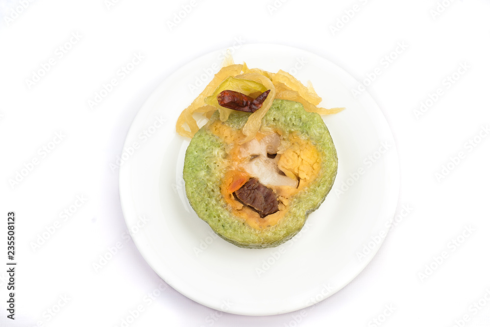 Vietnamese sticky rice with pork and egg Banh tet. They are rice and minced bean mix with boiled pork and egg, then wrapped in banana leaves, and cooked in hot water. You can eat along with cabbage or Vietnamese sticky rice with pork and egg Banh tet. They are rice and minced bean mix with boiled pork and egg, then wrapped in banana leaves, and cooked in hot water. You can eat along with cabbage or