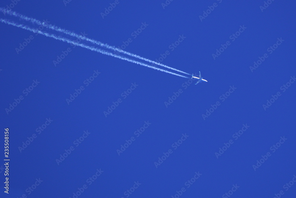 A plane of international airlines in the clear sky A plane of international airlines in the clear sky