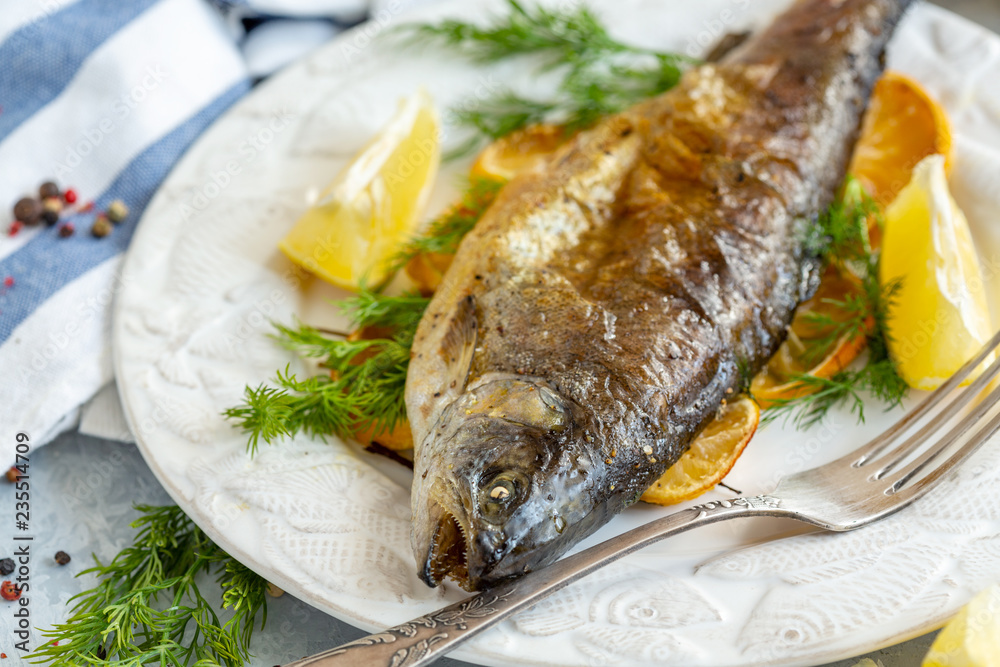 Baked lake trout with lemon and dill. Baked lake trout with lemon and dill.