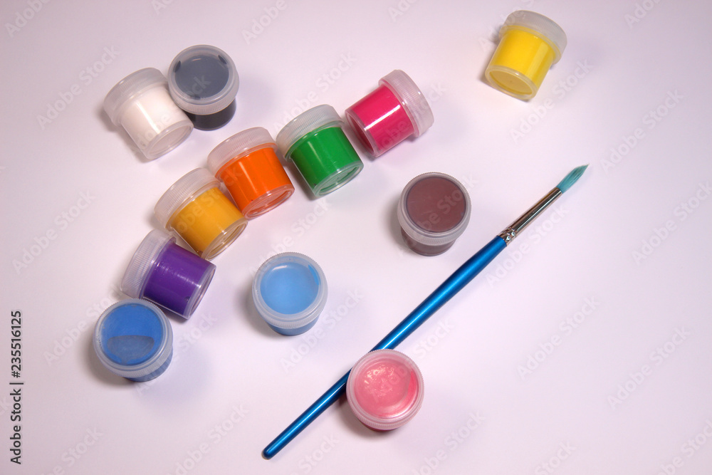 Colorful paints and brush Colorful paints and brush