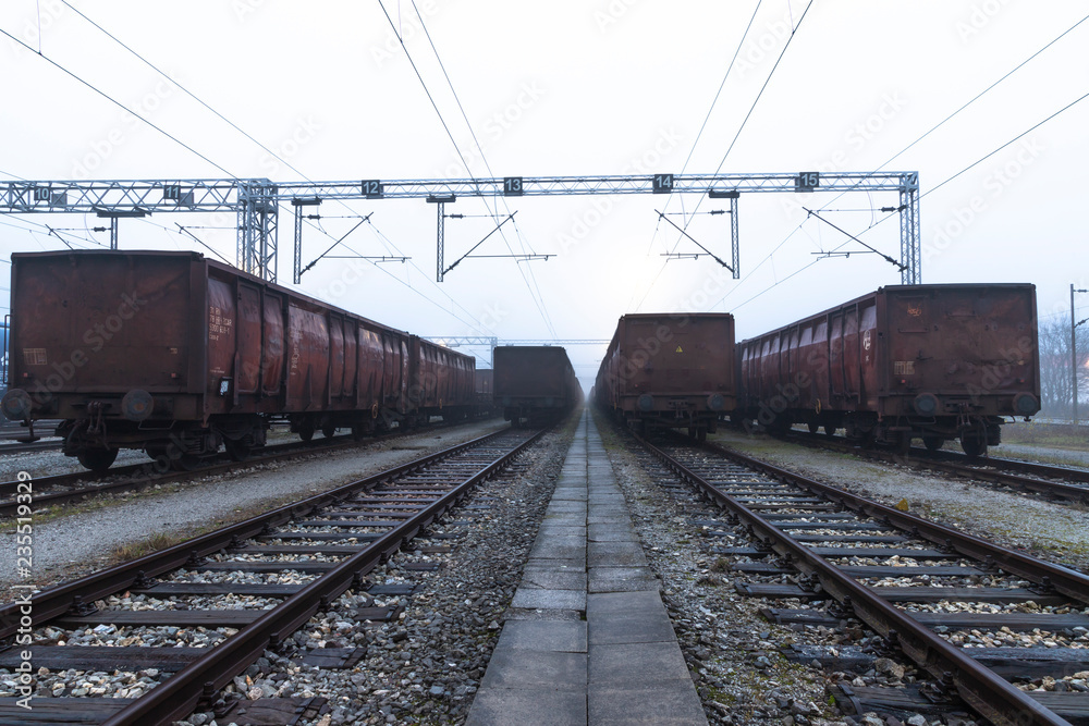 Old train wagons parked in a train station