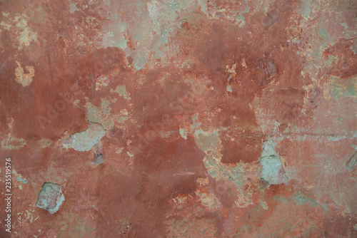 background texture old red wall. peeling paint