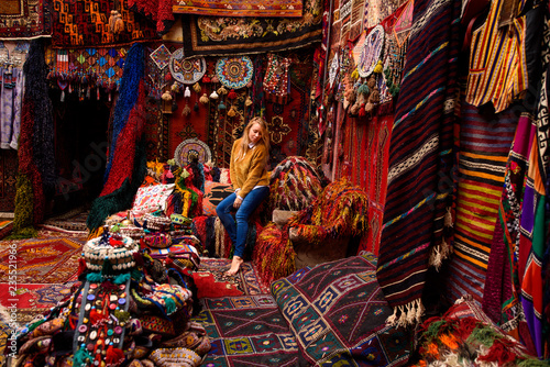 Woman in the Turkish carpet market