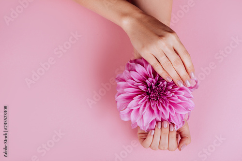 Closeup fingernails with pink fashion manicure