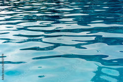 Patterns and ripples of swimming pool water surface photo