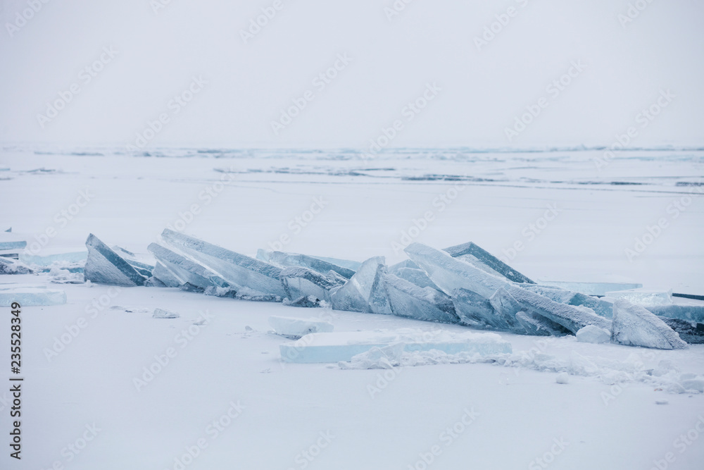 Turquoise ice floe. Winter landscape of Baikal lake Turquoise ice floe. Winter landscape of Baikal lake