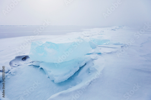 Turquoise ice floe. Winter landscape of Baikal lake © Crazy nook