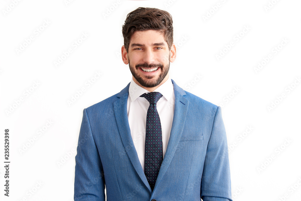 Businessman standing at isolated white background and wearing suit Businessman standing at isolated white background and wearing suit