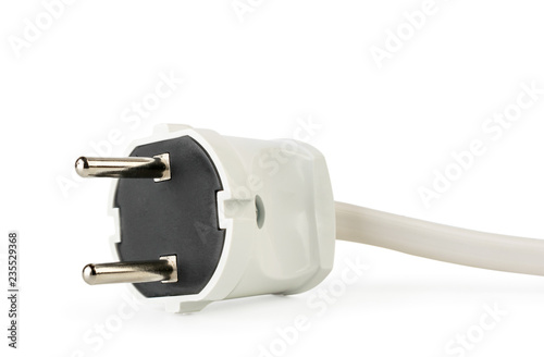 White electric cable plug close-up on a white. Isolated