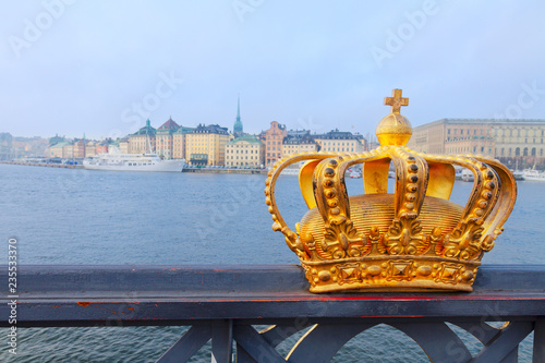 Royal crown and Stockholm cityscape at winter morning, Sweden
